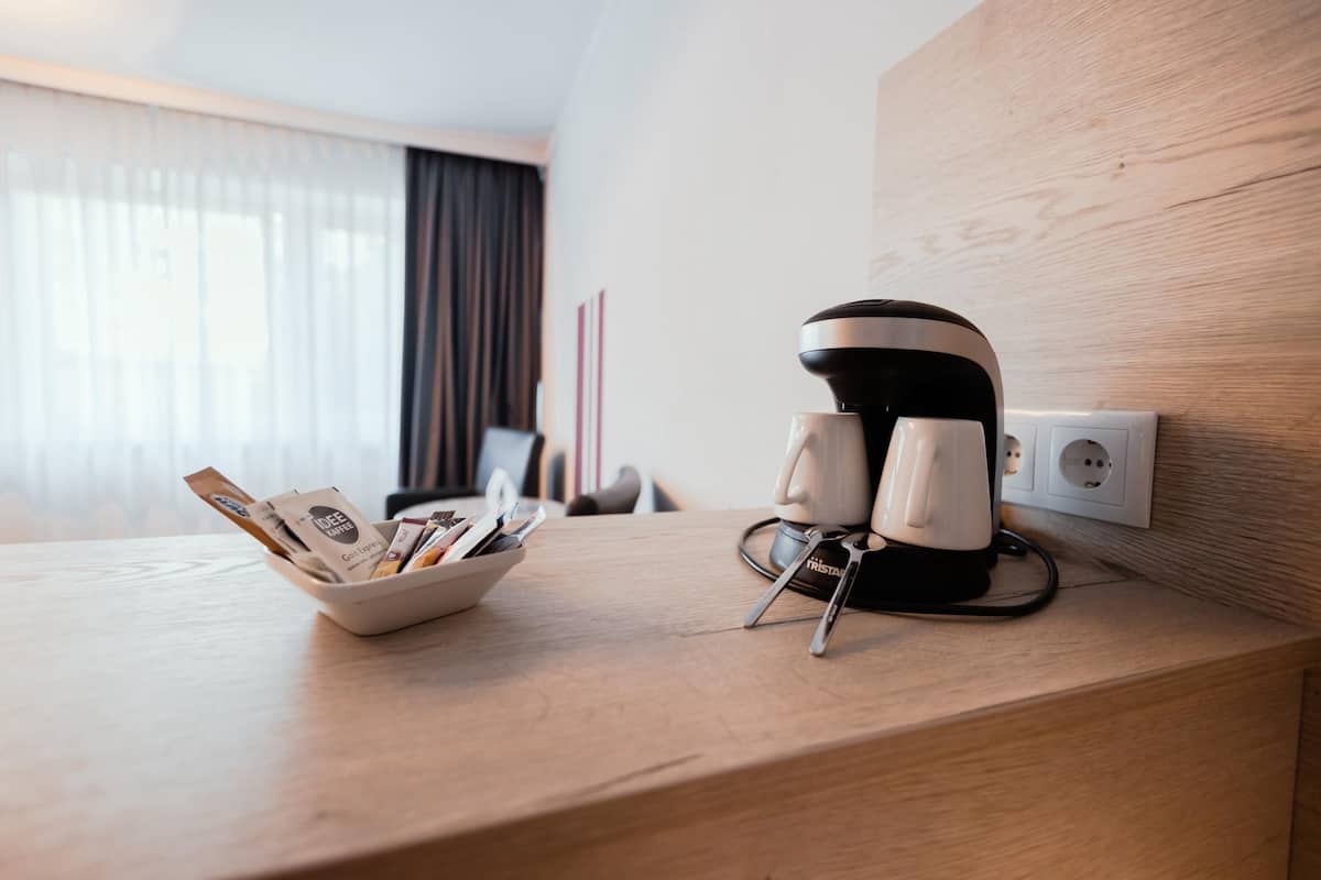 In-room safe, laptop workspace, blackout drapes, soundproofing