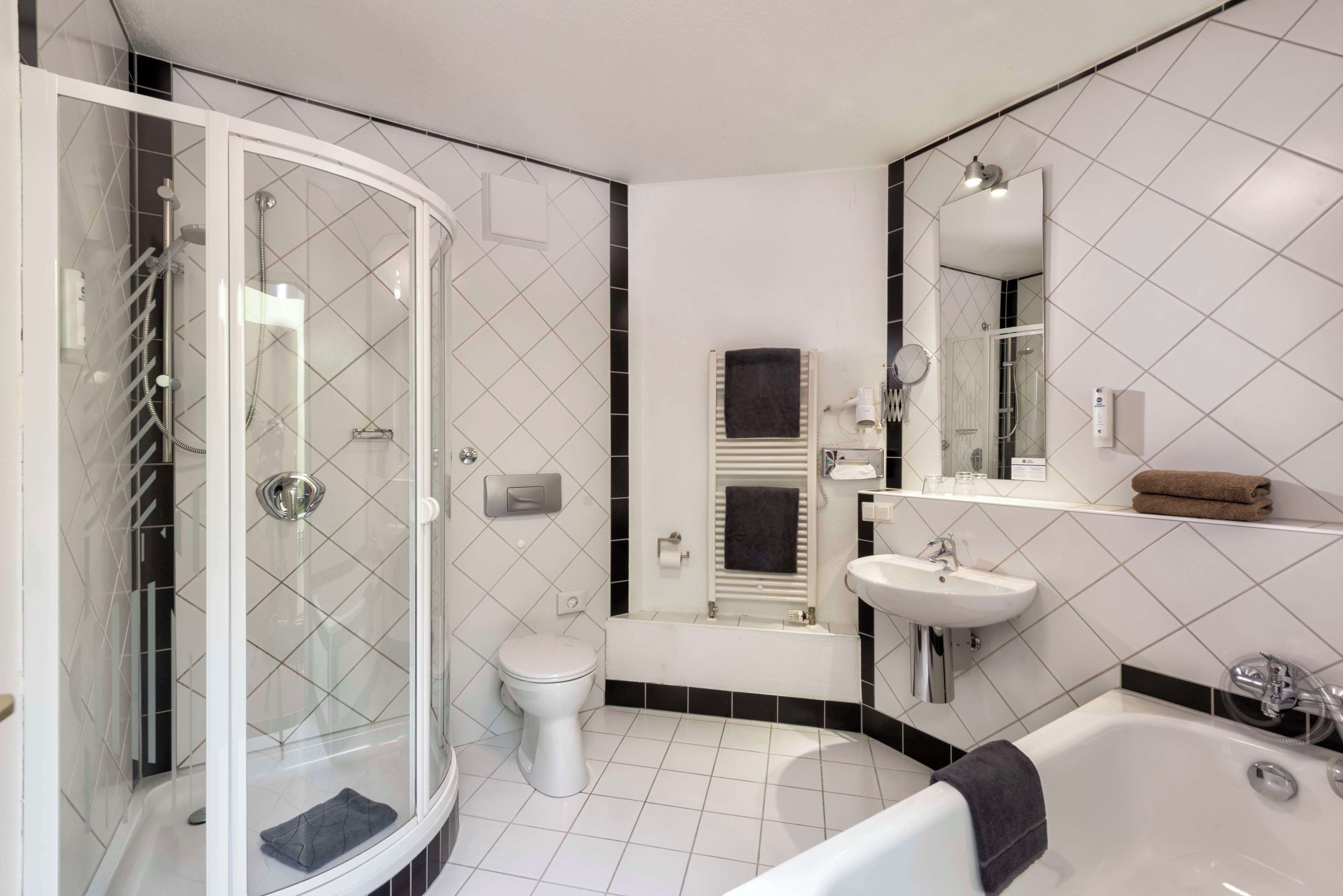 shower, free toiletries, hair dryer, towels