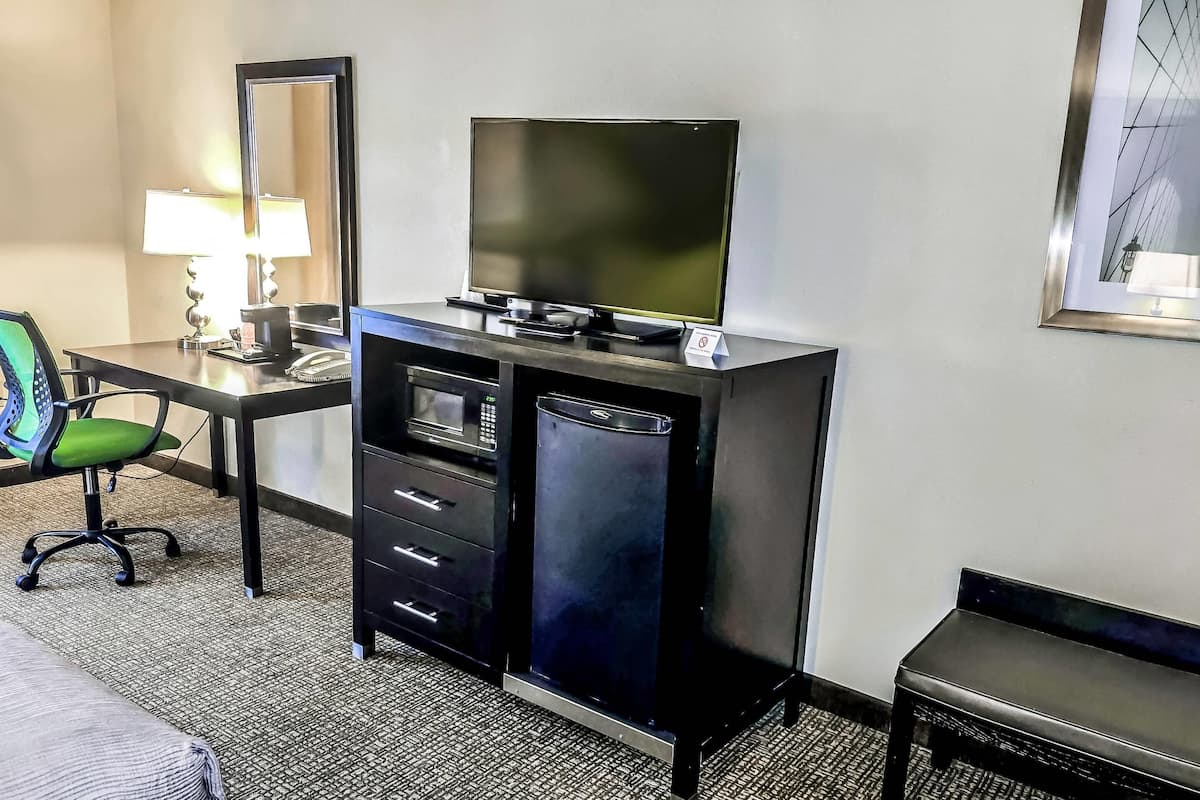 Laptop workspace, blackout drapes, soundproofing, iron/ironing board