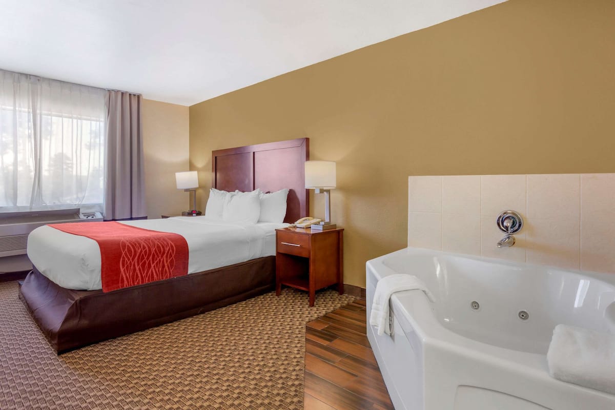 Deluxe Room, 1 King Bed, Non Smoking, Jetted Tub (Larger) | Premium bedding, pillowtop beds, desk, iron/ironing board