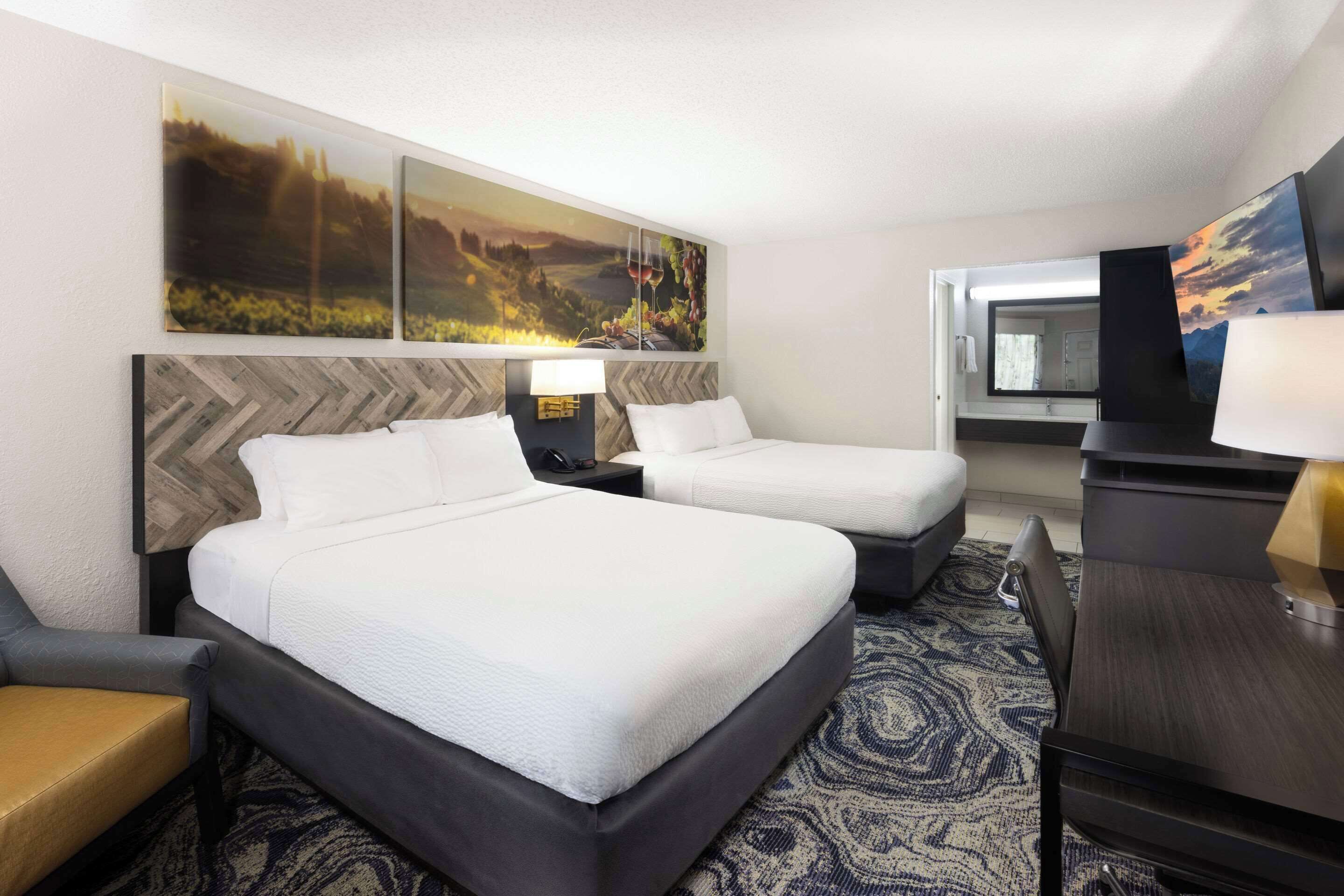 standard room, 2 queen beds, non smoking | desk, blackout curtains, iron/ironing board, free wifi