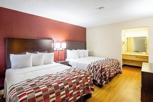 Deluxe Room, 2 Queen Beds, Non Smoking | Desk, soundproofing, iron/ironing board, cribs (free)