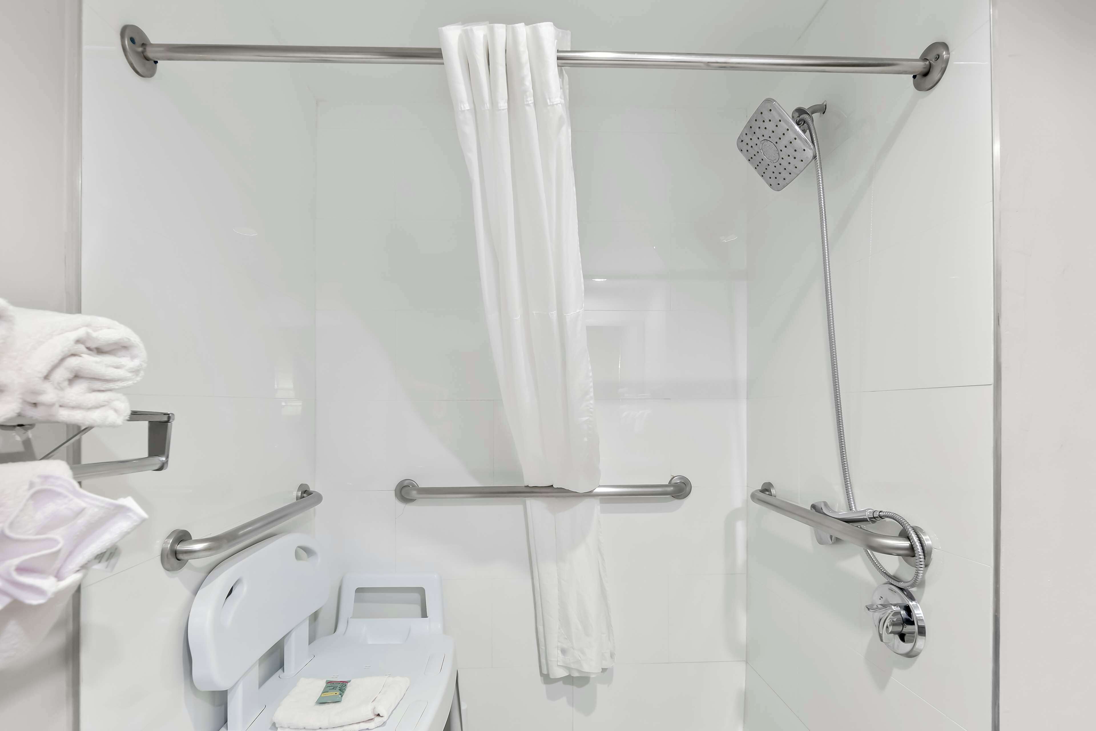 combined shower/bathtub, eco-friendly toiletries, hair dryer, towels