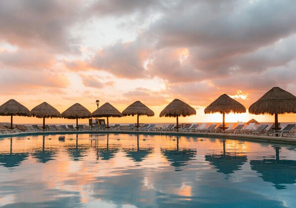 2 outdoor pools, pool umbrellas, pool loungers