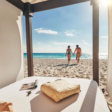 On the beach, sun loungers, beach towels