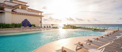 2 outdoor pools, pool umbrellas, sun loungers