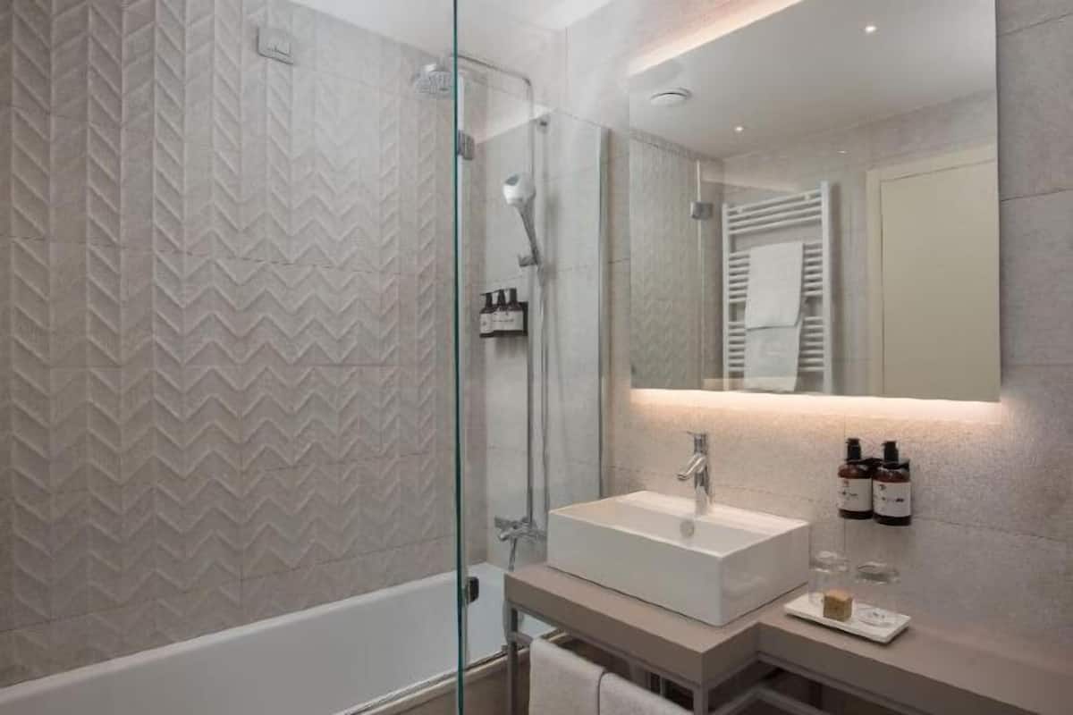 Bathroom | Eco-friendly toiletries, hair dryer, bidet, towels