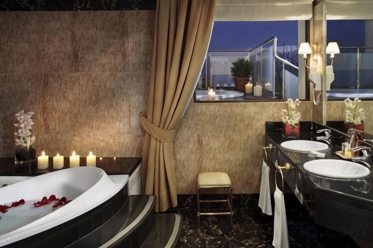 Bathroom | Designer toiletries, hair dryer, bathrobes, slippers