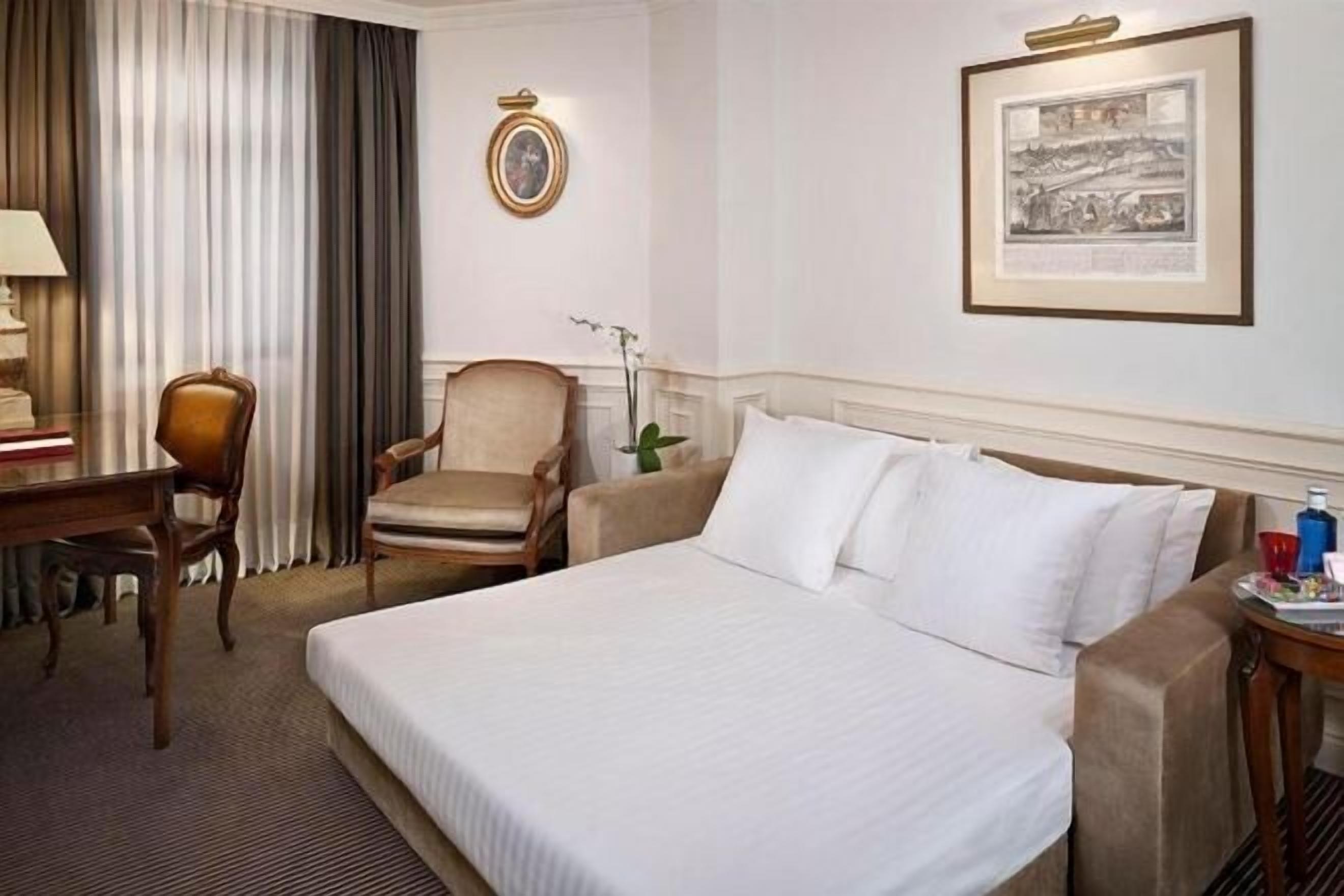Premium bedding, down duvets, minibar, in-room safe
