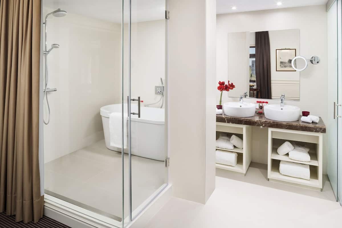 Bathroom | Designer toiletries, hair dryer, bathrobes, slippers