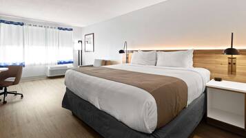 Desk, laptop workspace, blackout curtains, iron/ironing board