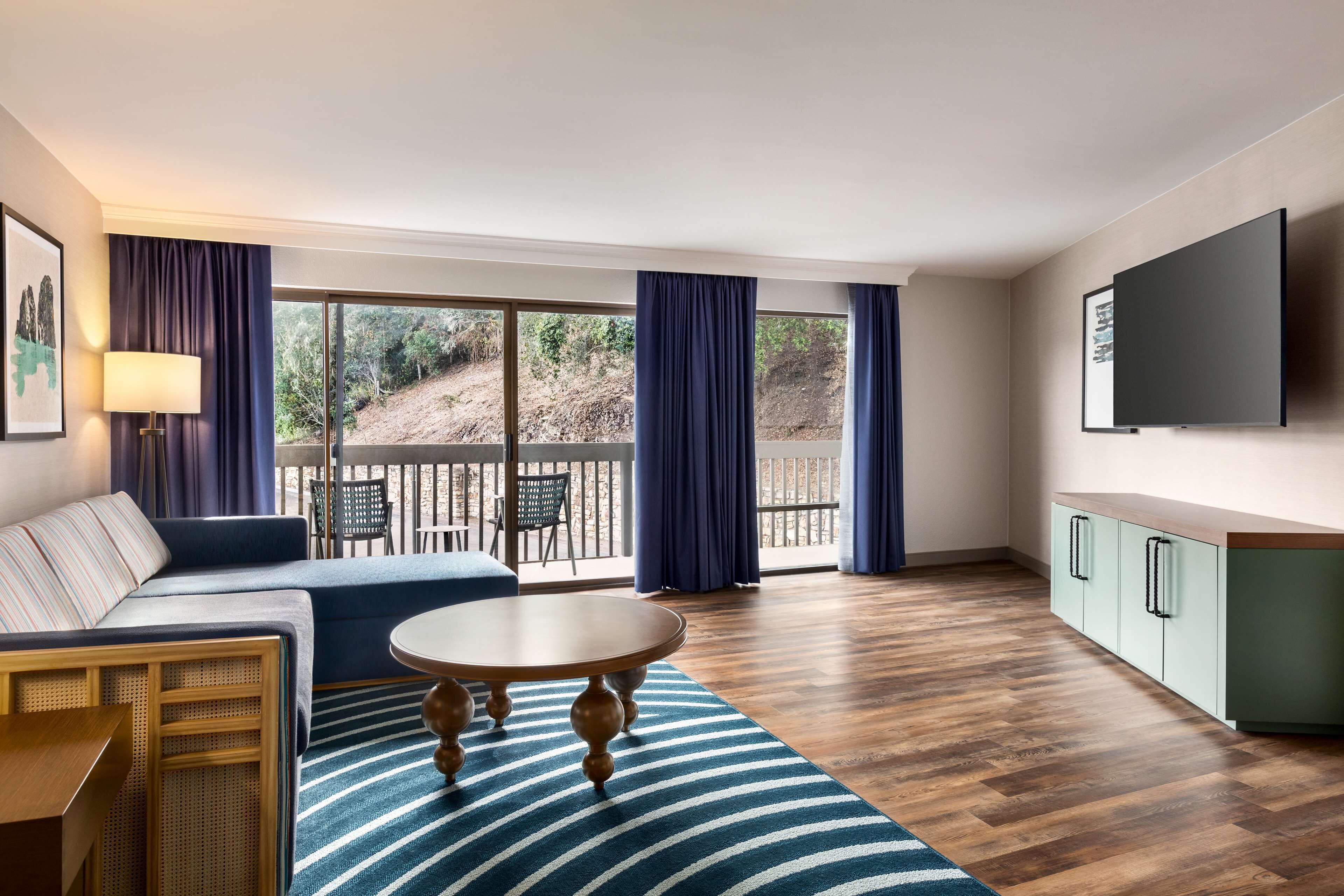 suite, 1 bedroom, non smoking, balcony (2 queen beds with sofabed) | living area | flat-screen tv, pay films