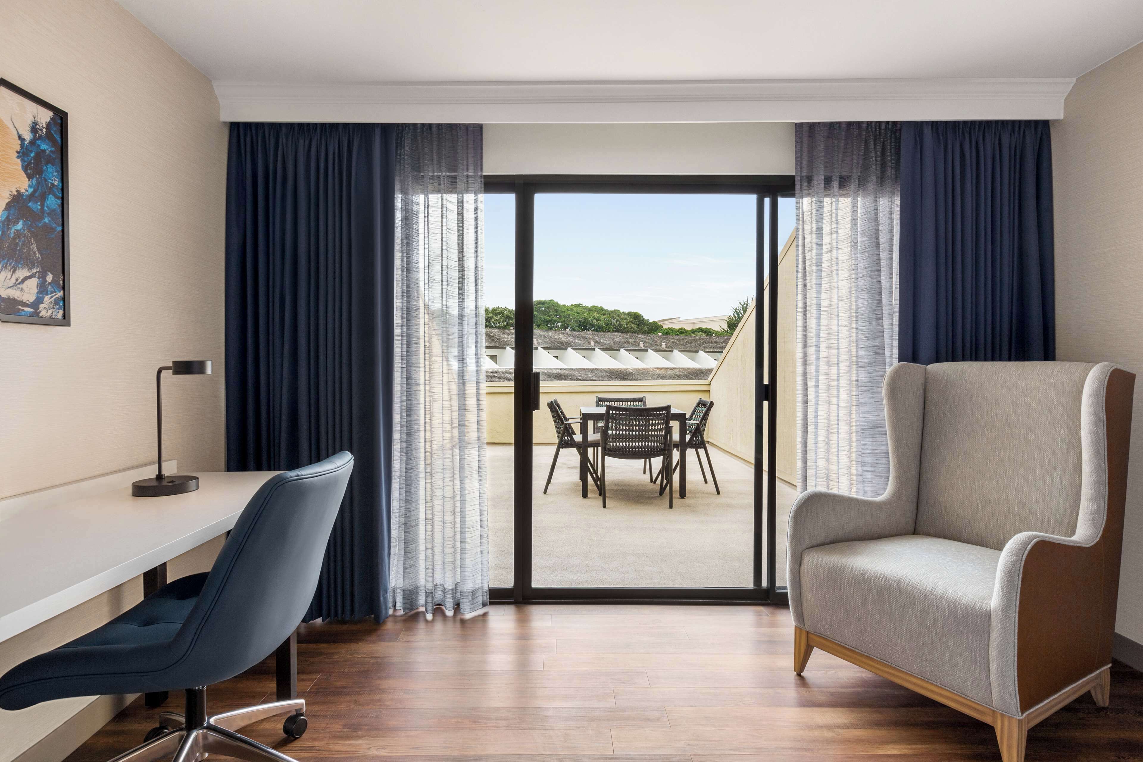 room, 1 king bed, patio | premium bedding, in-room safe, desk, iron/ironing board