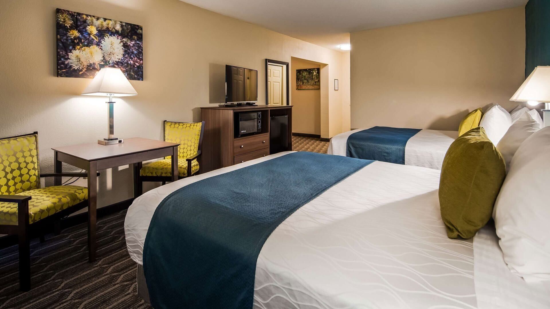 Premium bedding, down duvets, Select Comfort beds, laptop workspace