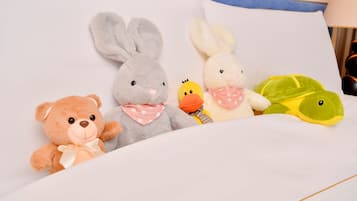 Cozy retreat with a plush bed and four adorable companions.