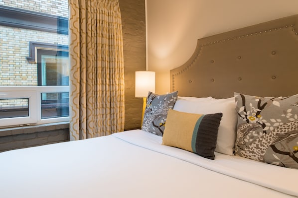 Premium bedding, desk, blackout curtains, iron/ironing board