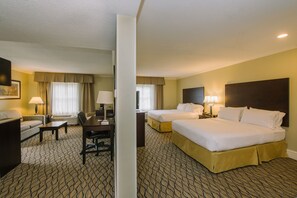Premium bedding, desk, laptop workspace, blackout drapes