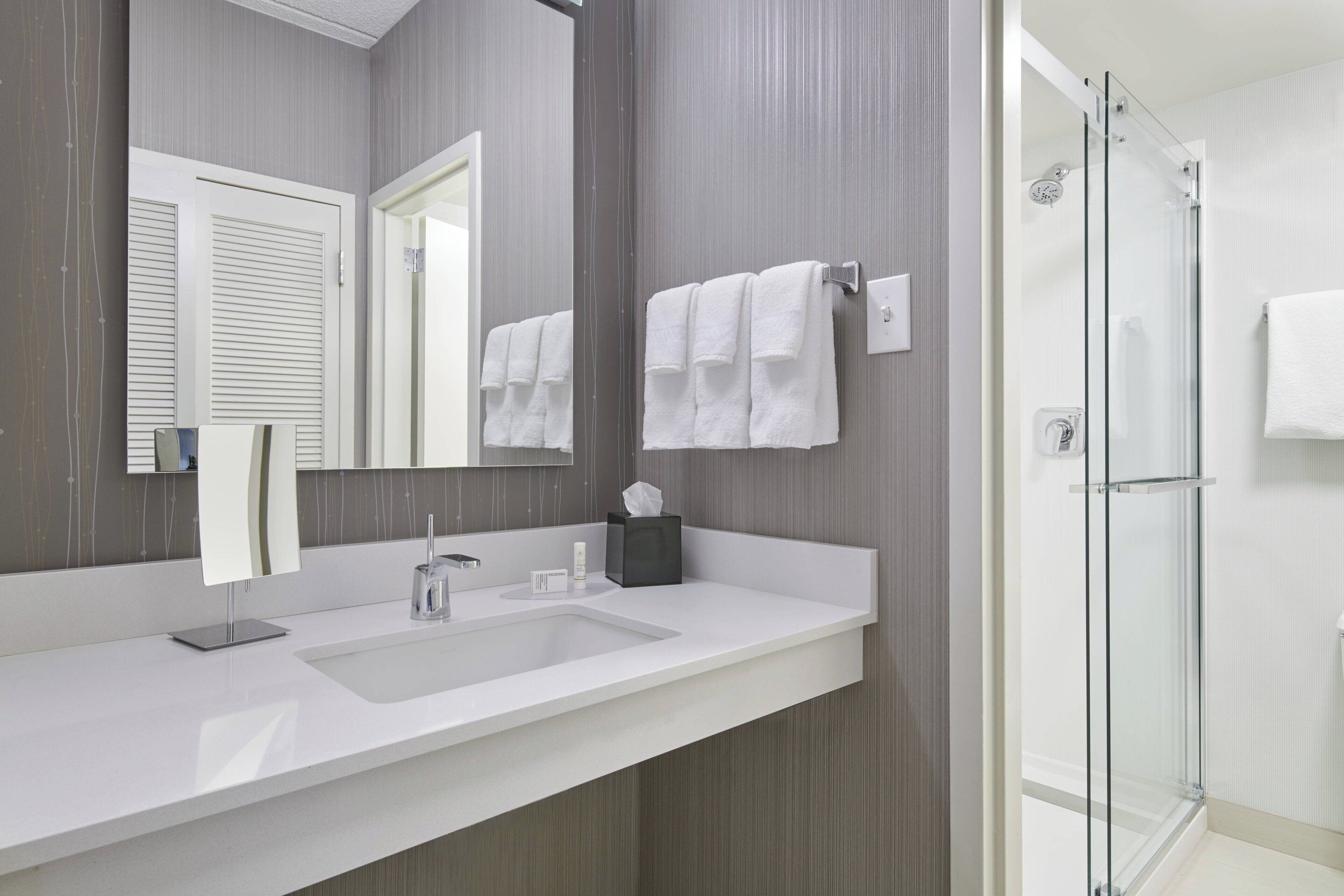 combined shower/bathtub, free toiletries, hair dryer, towels