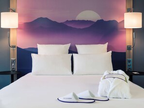 Ropa de cama de alta calidad, colchones con pillow-top y minibar 