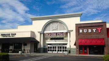 A building with a sign for 'Treasure Coast Square' and 'RubyT' on the right.