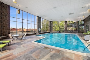 Indoor pool, open 7:00 AM to 11:00 PM, pool loungers