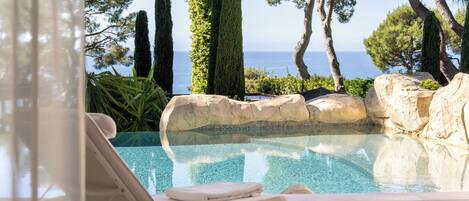 Suite, 1 King Bed, Terrace (Pool) | Living area | 32-cm flat-screen TV with cable channels, TV, pay movies