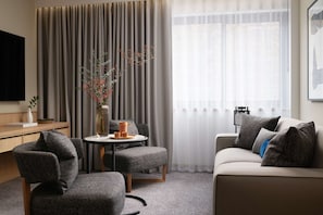 One Bedroom Suite | Living area | Smart TV