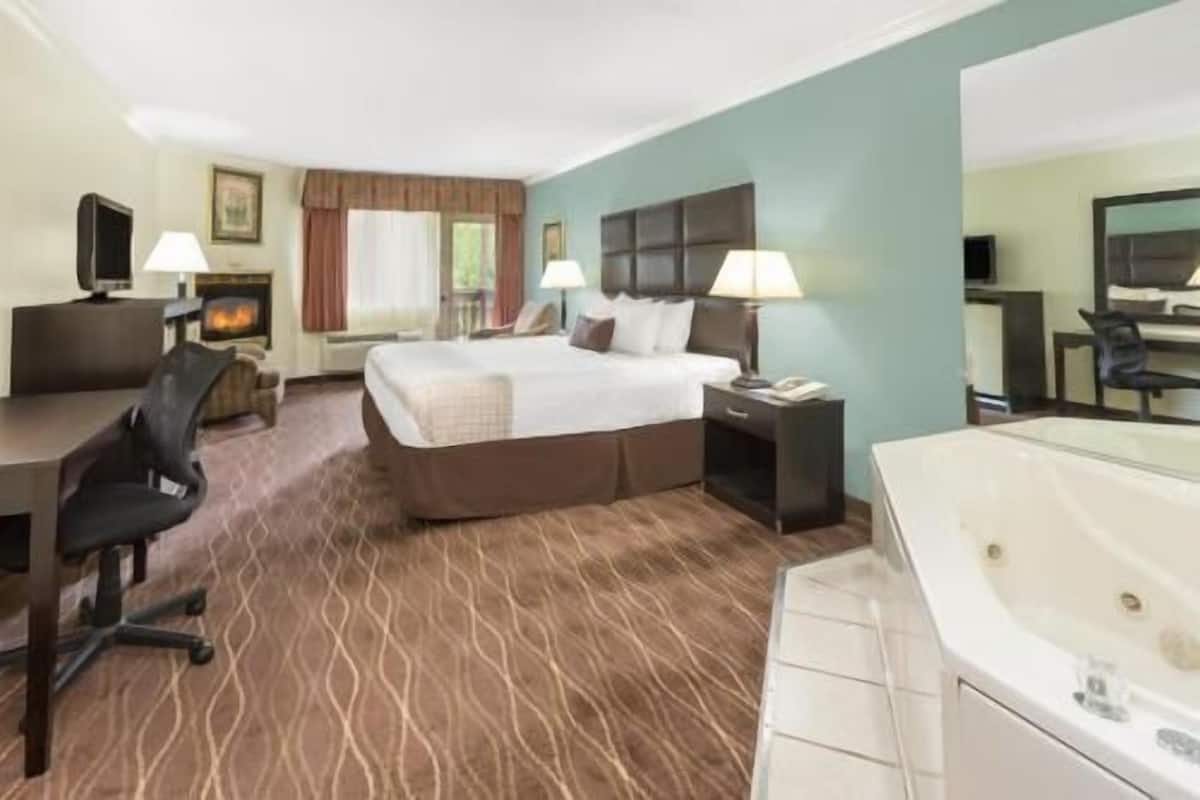 Desk, blackout drapes, iron/ironing board, rollaway beds