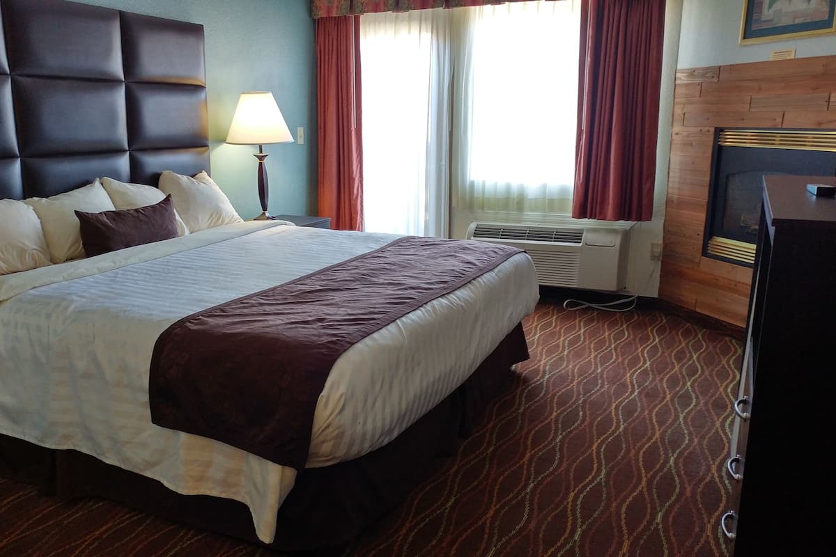Desk, blackout drapes, iron/ironing board, rollaway beds