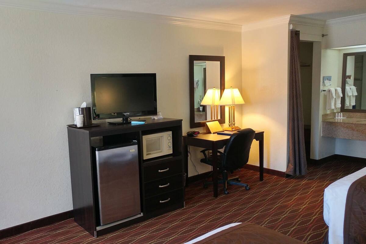 Desk, blackout drapes, iron/ironing board, rollaway beds