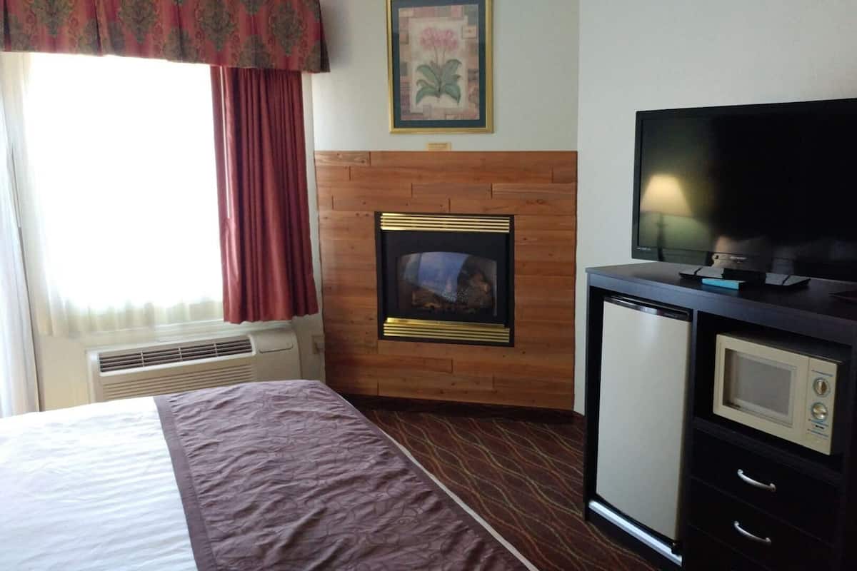 Desk, blackout drapes, iron/ironing board, rollaway beds