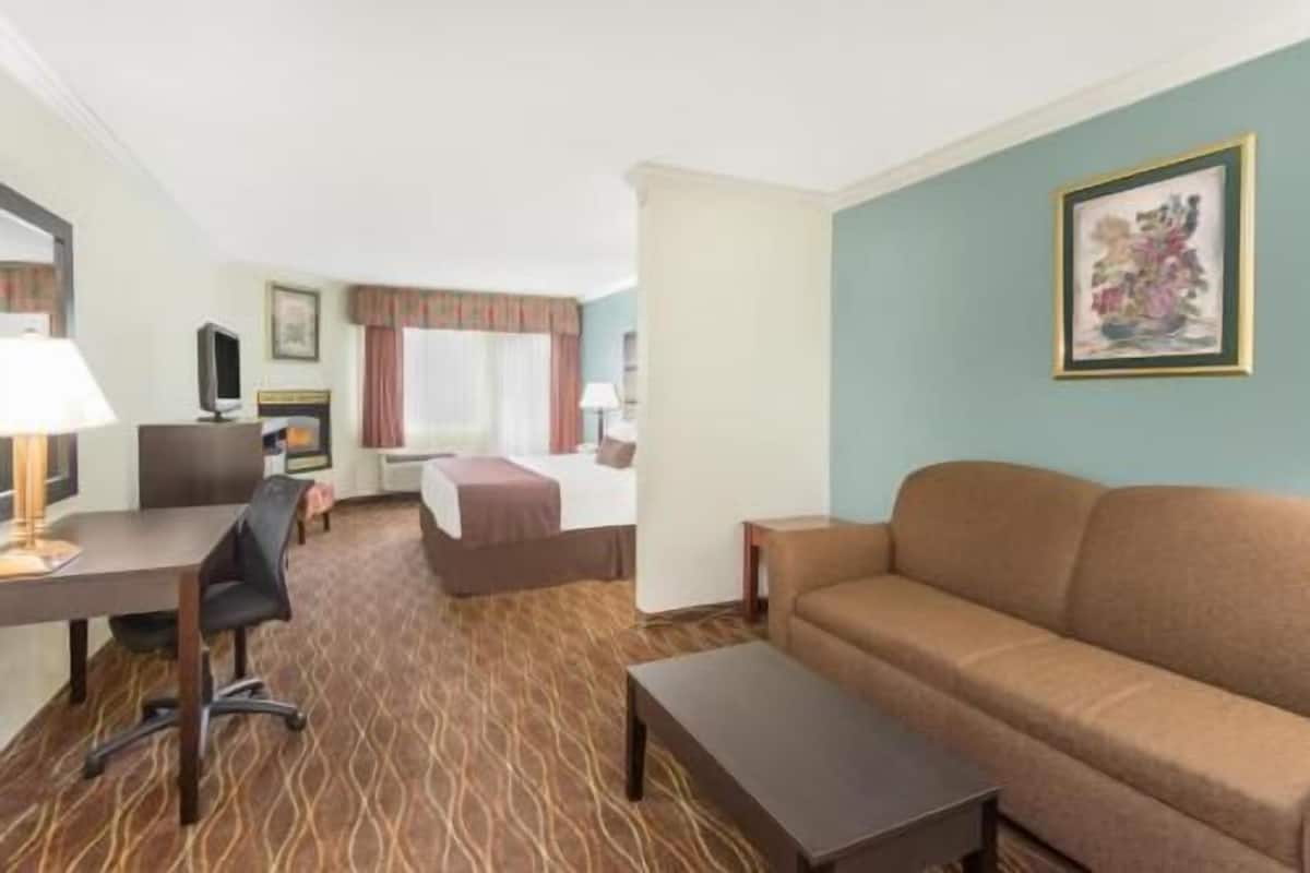 Desk, blackout drapes, iron/ironing board, rollaway beds