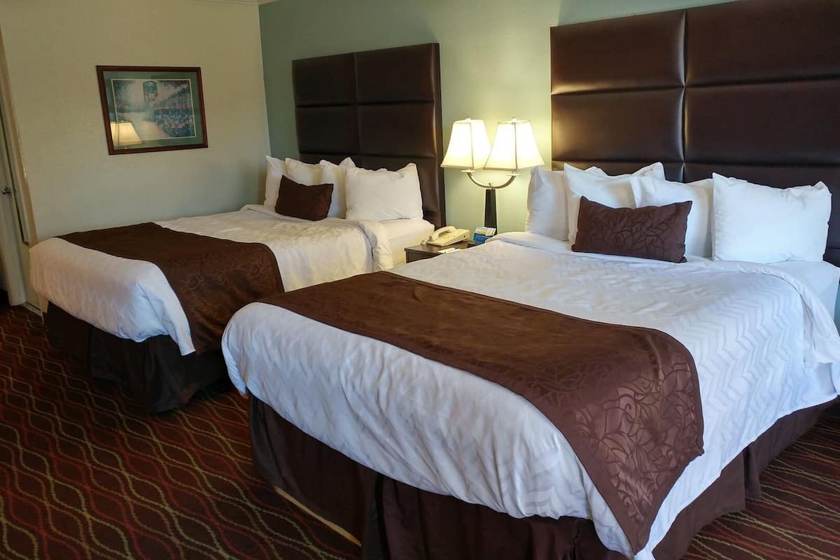 Desk, blackout drapes, iron/ironing board, rollaway beds