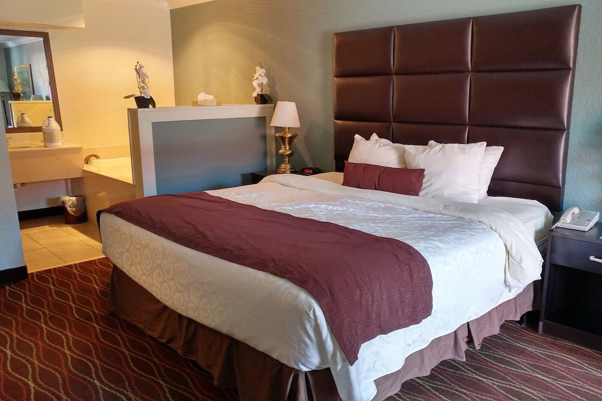 Desk, blackout drapes, iron/ironing board, rollaway beds