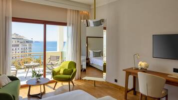 Executive Triple Room, Sea View | Premium bedding, minibar, in-room safe, desk