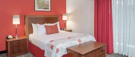 Desk, laptop workspace, blackout drapes, WiFi