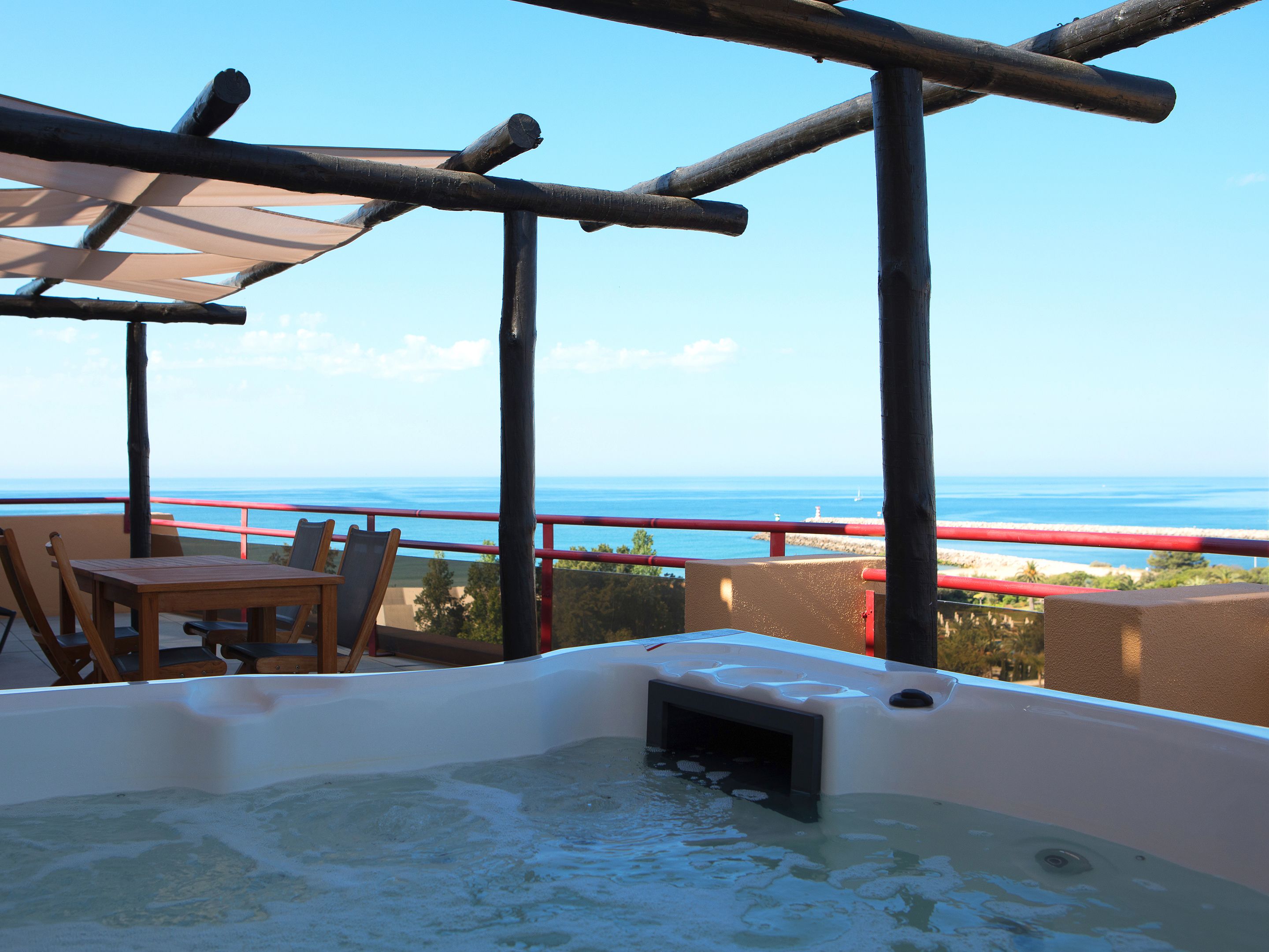 presidential penthouse, 1 double bed, hot tub, ocean view | balcony