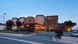 The Hawthorne Inn & Conference Center with a brick facade, a prominent entrance, and a landscaped front area. - Hawthorne Inn and Conference Center (Winston-Salem)