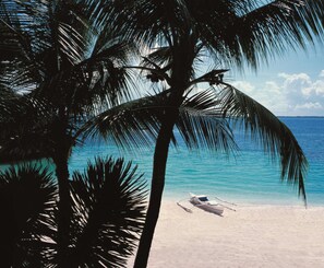 Private beach, white sand, free beach cabanas, sun loungers