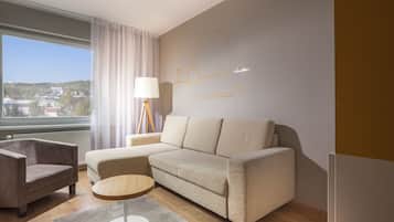 Superior Suite | Living area | 43-inch LCD TV with cable channels, TV