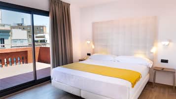 Ropa de cama de alta calidad, minibar, caja fuerte y escritorio