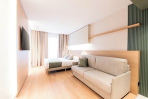 Premium bedding, memory-foam beds, in-room safe, desk