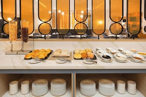 Daily buffet breakfast (USD 20 per person)