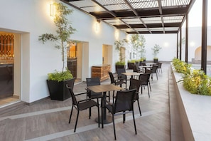 Breakfast, lunch served; local and international cuisine, pool views