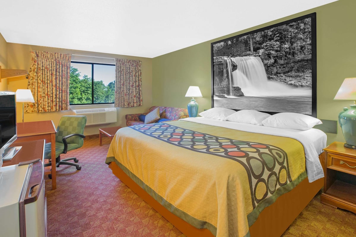 Chambre, 1 très grand lit, non-fumeur | Bureau, fer et planche à repasser, accès au Wi-Fi (inclus)