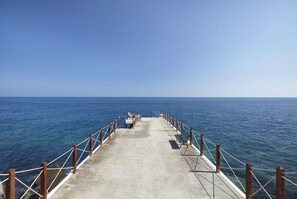 Stroll along the pier and enjoy the serene atmosphere.