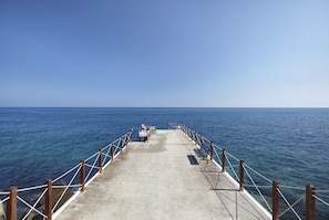 Stroll along the pier and enjoy the serene atmosphere.