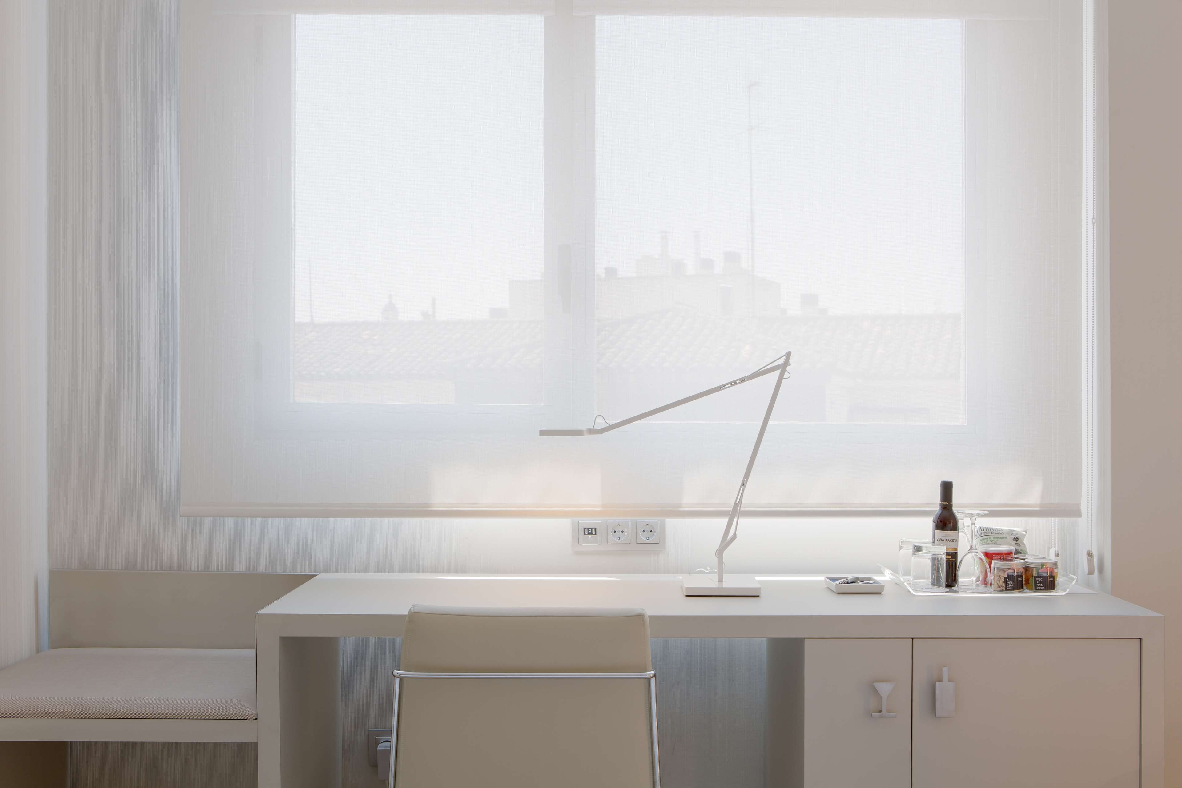 minibar, desk, blackout curtains, iron/ironing board