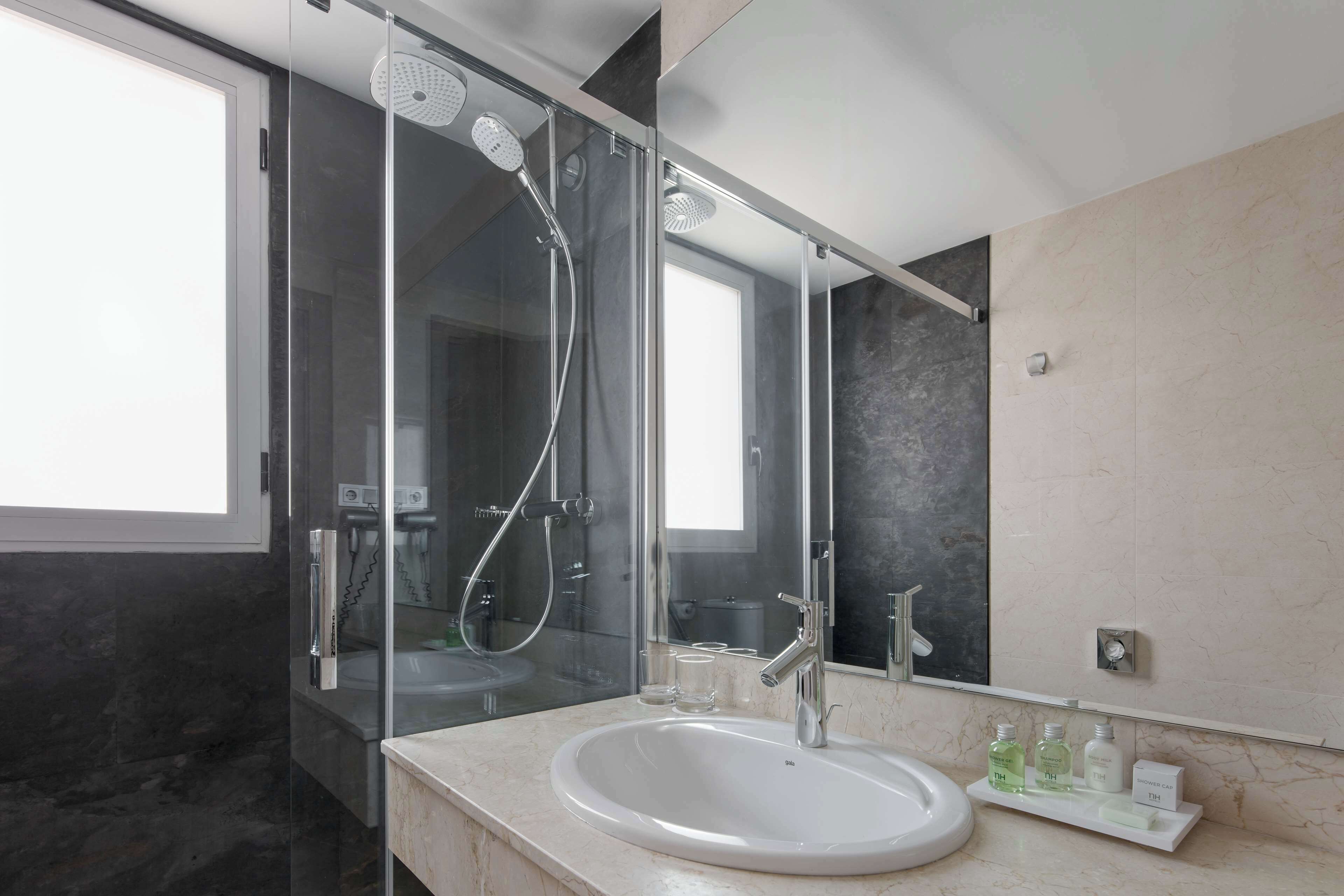 shower, eco-friendly toiletries, hair dryer, towels