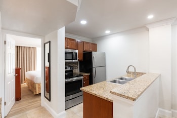 Villa, 1 Bedroom | Private kitchen | Full-size fridge, microwave, oven, coffee/tea maker at Westgate Blue Tree Resort in Lake Buena Vista